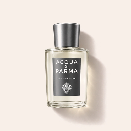 Acqua di Parma Colonia Pura EDC 100 ml, flakon vleže na béžovém pozadí – MrRizz