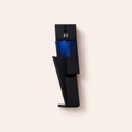Flakon parfému Carolina Herrera Bad Boy Cobalt Elixir EDP 50 ml na béžovém pozadí – MrRizz