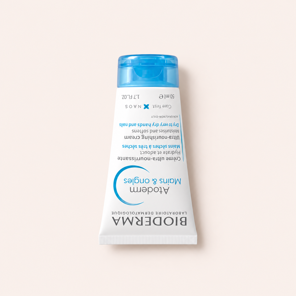 Krém na ruce BIODERMA Atoderm Ultra-Nourishing Cream 50 ml na béžovém pozadí – MrRizz