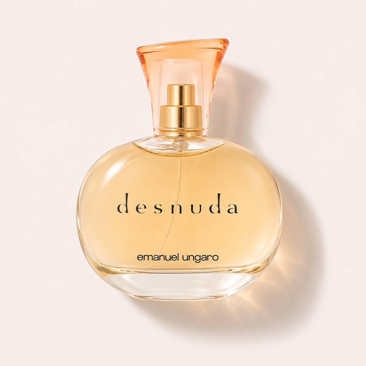 Flakon Emanuel Ungaro Desnuda Le Parfum EDP 100 ml na béžovém pozadí – MrRizz