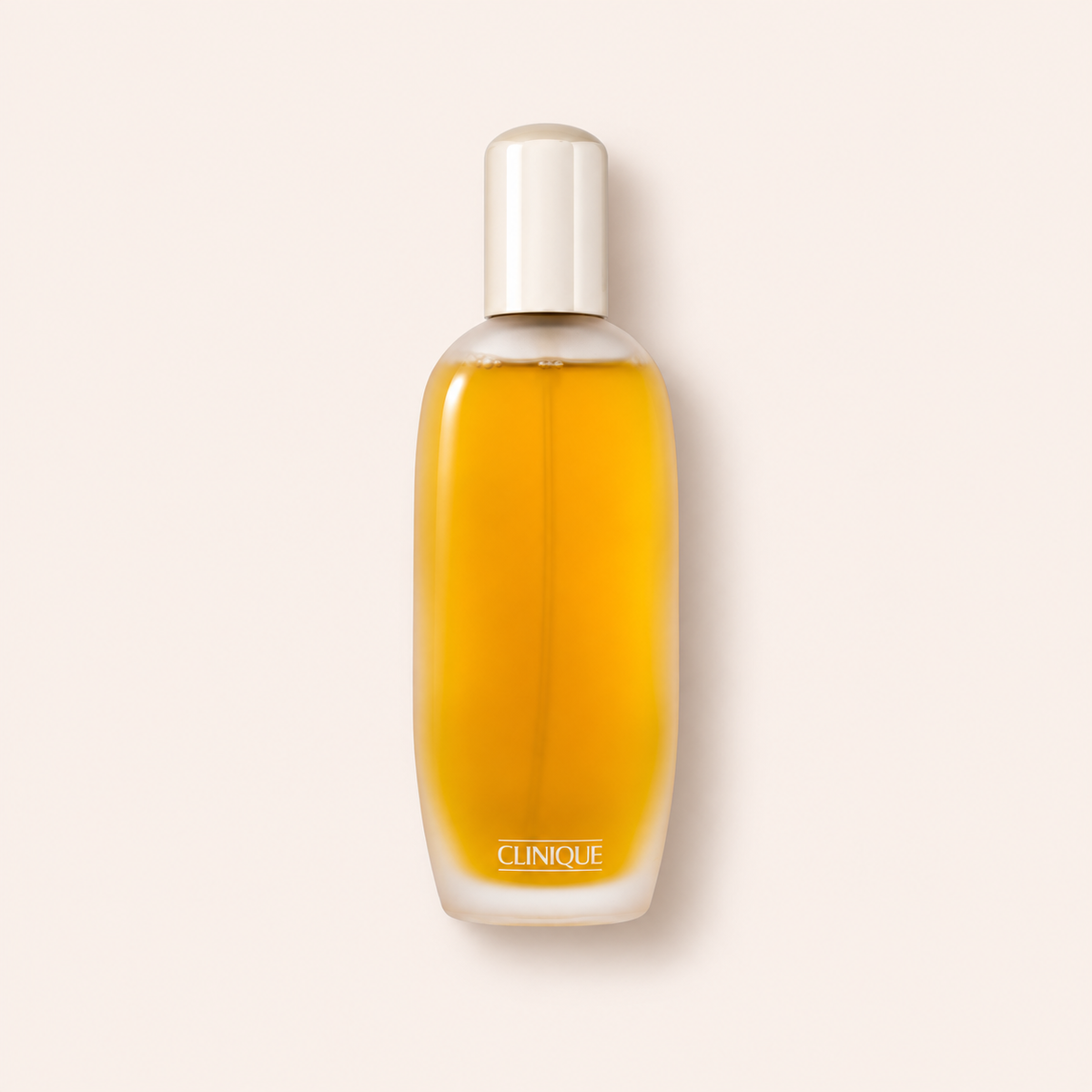 Clinique Aromatics Elixir 100 ml – produktová fotografie na béžovém pozadí MrRizz