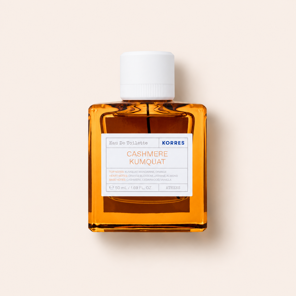 Korres Cashmere Kumquat 50 ml – produktová fotografie na béžovém pozadí MrRizz