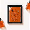 Parfemovy obraz Gucci Guilty Pour Homme Absolute v cernem ramu - ilustracni fotografie