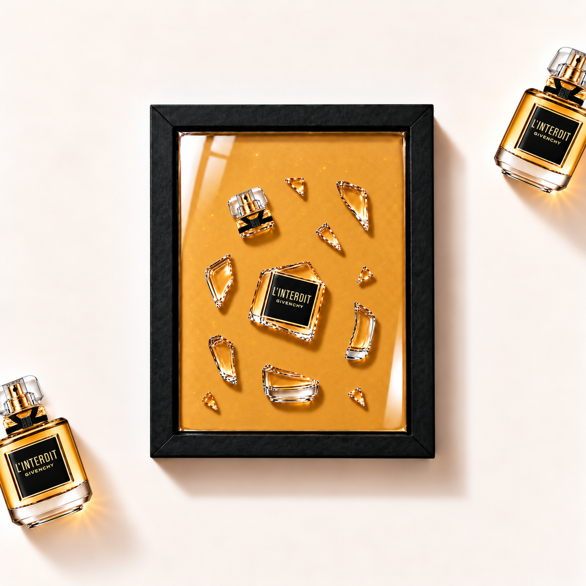Parfemovy obraz L’Interdit Le Parfum Givenchy v cernem ramu - ilustracni fotografie